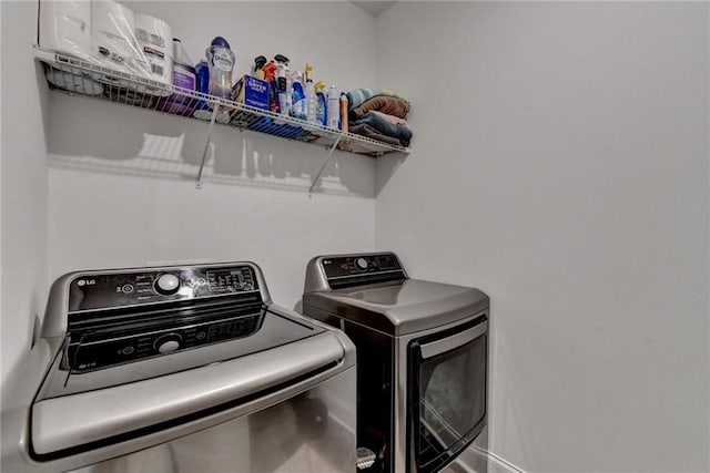 2129 Charmond Dr, Monroe, GA 30656 - washroom with washing machine and clothes dryer