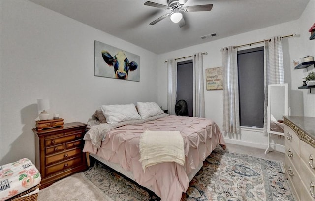 2129 Charmond Dr, Monroe, GA 30656 - carpeted bedroom featuring a ceiling fan and baseboards