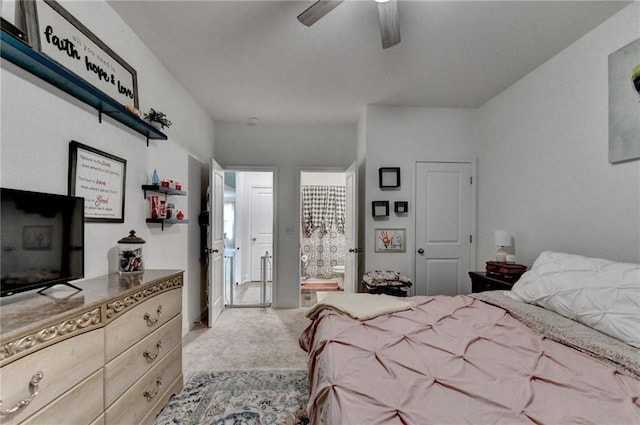 2129 Charmond Dr, Monroe, GA 30656 - carpeted bedroom with connected bathroom and ceiling fan