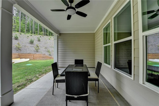 2129 Charmond Dr, Monroe, GA 30656 - view of patio with a ceiling fan and outdoor dining area