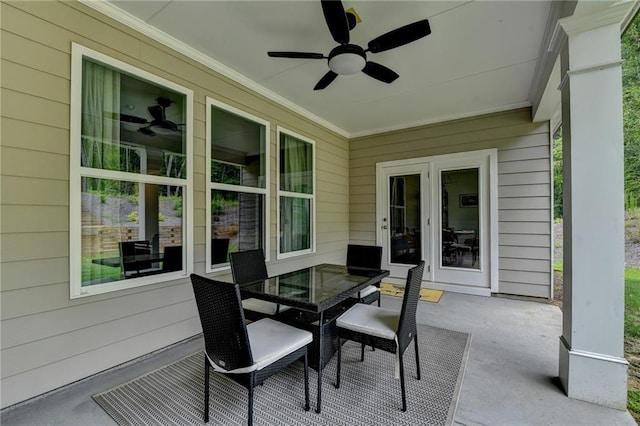 2129 Charmond Dr, Monroe, GA 30656 - view of patio featuring ceiling fan, outdoor dining area, and french doors