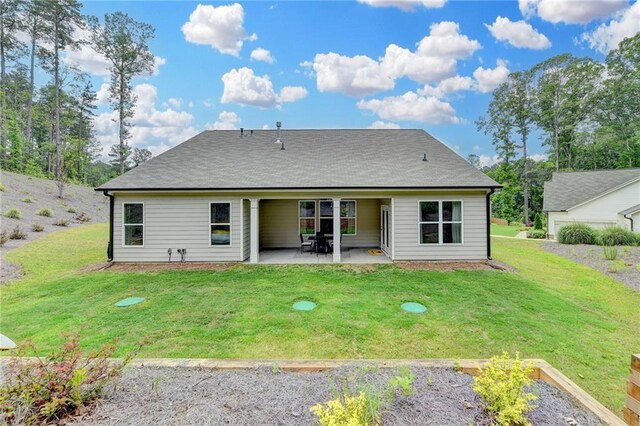 2129 Charmond Dr, Monroe, GA 30656 - rear view of house with a patio and a yard