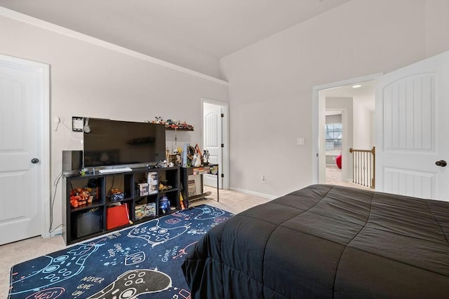 bedroom featuring vaulted ceiling, carpet floors, and baseboards