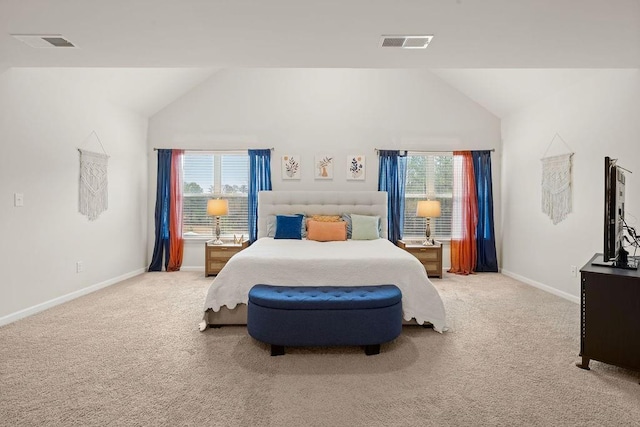 carpeted bedroom with visible vents, baseboards, and multiple windows