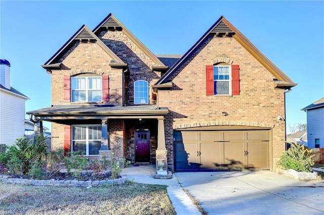 view of front of property featuring a garage