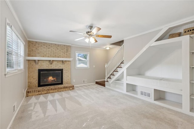1231 Sanden Ferry Dr, Decatur, GA 30033 - unfurnished living room featuring built in features, visible vents, ornamental molding, stairs, and carpet flooring