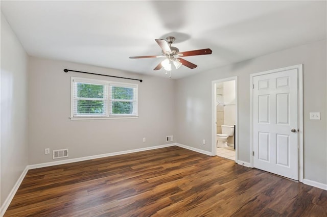 1231 Sanden Ferry Dr, Decatur, GA 30033 - empty room featuring a ceiling fan, wood finished floors, visible vents, and baseboards