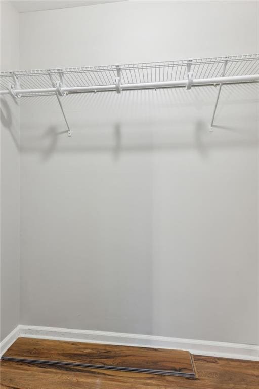 1231 Sanden Ferry Dr, Decatur, GA 30033 - walk in closet with wood finished floors