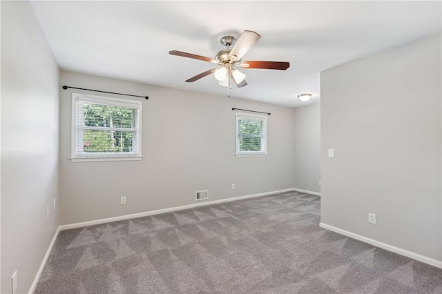 1231 Sanden Ferry Dr, Decatur, GA 30033 - carpeted spare room with visible vents, baseboards, and ceiling fan