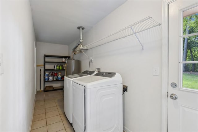 1231 Sanden Ferry Dr, Decatur, GA 30033 - washroom with light tile patterned floors, laundry area, gas water heater, and washer and dryer