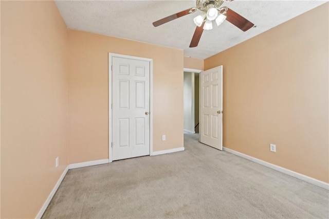 1056 Shadow Lake Dr, Lithonia, GA 30058 - unfurnished bedroom featuring carpet flooring and a ceiling fan
