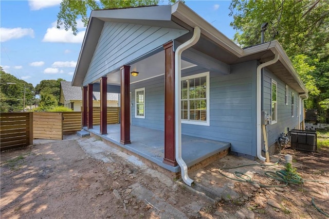 85 Ollie St, Atlanta, GA 30314 - view of side of property featuring a central AC unit and a patio