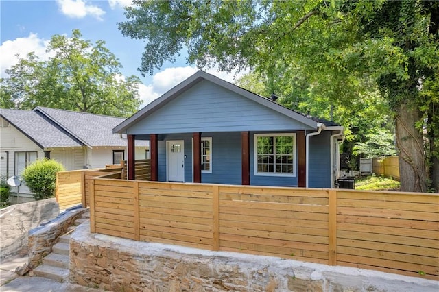 85 Ollie St, Atlanta, GA 30314 - bungalow-style home with a fenced front yard and covered porch