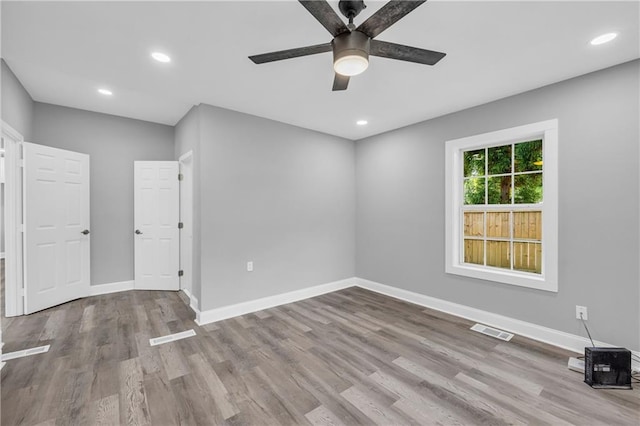 85 Ollie St, Atlanta, GA 30314 - spare room featuring ceiling fan, wood finished floors, and recessed lighting