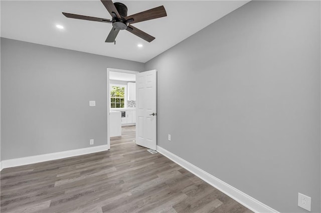85 Ollie St, Atlanta, GA 30314 - empty room with ceiling fan, wood finished floors, and recessed lighting