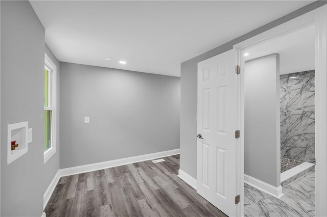 85 Ollie St, Atlanta, GA 30314 - below grade area featuring recessed lighting and marble finish flooring