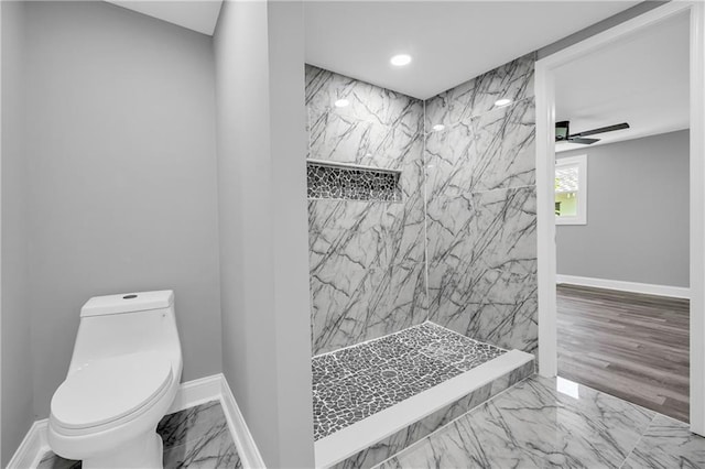 85 Ollie St, Atlanta, GA 30314 - bathroom featuring marble look tiles, a marble finish shower, recessed lighting, and ceiling fan