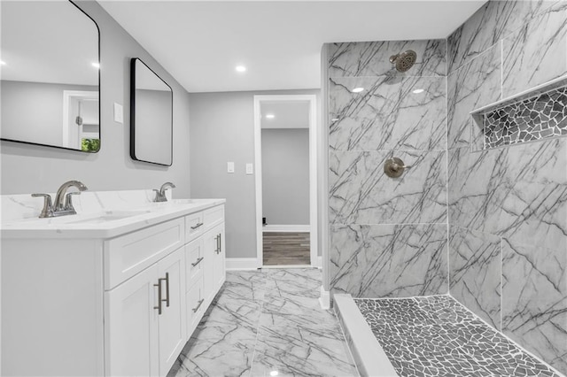 85 Ollie St, Atlanta, GA 30314 - full bath with marble look tile flooring, double vanity, a marble finish shower, and recessed lighting