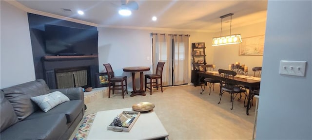 carpeted living room with crown molding