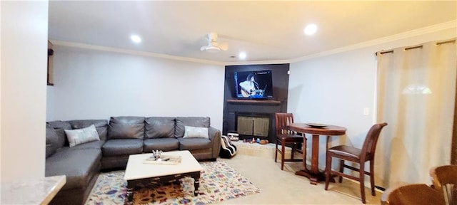 carpeted living room with ornamental molding and radiator