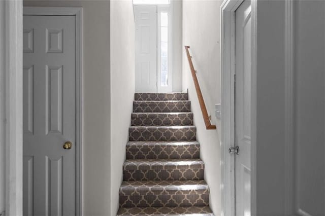 stairs with stone finish flooring