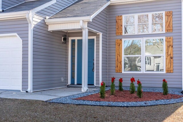 entrance to property with a garage