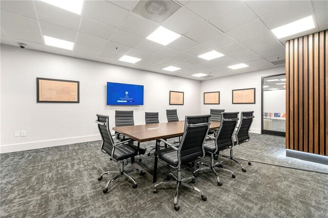 office area featuring a paneled ceiling and carpet floors