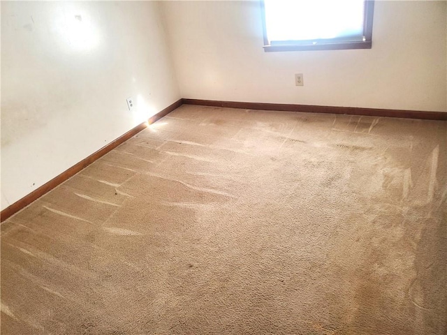 unfurnished room with carpet