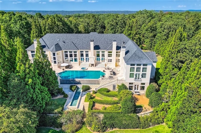 9620 Cedar Grove Rd, Chattahoochee Hills, GA 30213 - view of subject property with a heavily wooded area and a pool area