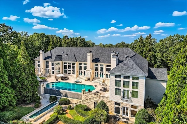 9620 Cedar Grove Rd, Chattahoochee Hills, GA 30213 - rear view of property with french doors, a chimney, a patio area, an outdoor pool, and entry steps