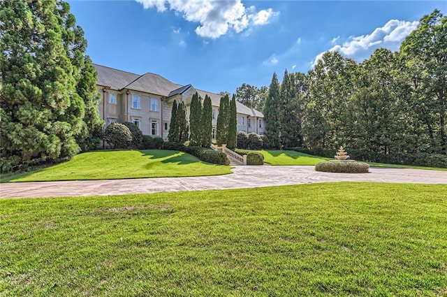 9620 Cedar Grove Rd, Chattahoochee Hills, GA 30213 - view of front of house with a front lawn