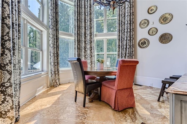 9620 Cedar Grove Rd, Chattahoochee Hills, GA 30213 - dining room with stone finish floors and a towering ceiling