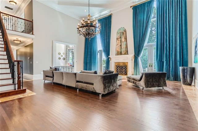 9620 Cedar Grove Rd, Chattahoochee Hills, GA 30213 - common area with crown molding, stairway, and a towering ceiling