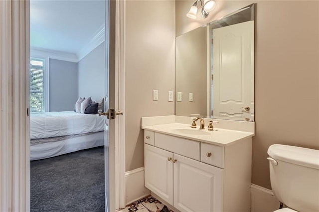 9620 Cedar Grove Rd, Chattahoochee Hills, GA 30213 - ensuite bathroom with vanity, toilet, baseboards, and ornamental molding