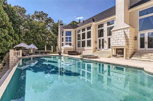 9620 Cedar Grove Rd, Chattahoochee Hills, GA 30213 - view of pool featuring french doors, a patio area, a pool with connected hot tub, and entry steps