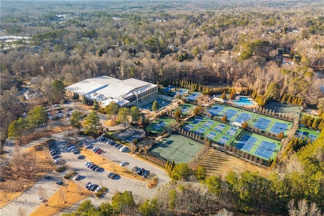 drone / aerial view featuring a view of trees