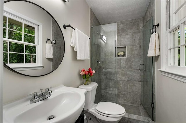 2694 Hickory Valley Dr, Snellville, GA 30078 - full bath with a stall shower and a textured ceiling