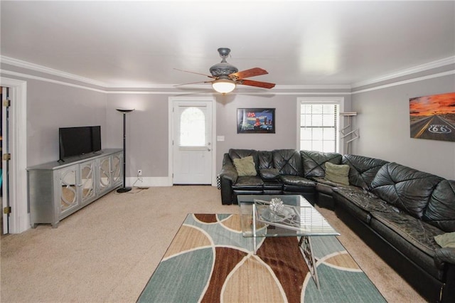 1120 Carl Bethlehem Rd, Winder, GA 30680 - carpeted living room featuring healthy amount of natural light, ceiling fan, and crown molding