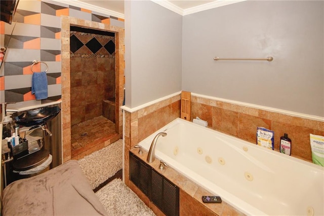 1120 Carl Bethlehem Rd, Winder, GA 30680 - bathroom featuring ornamental molding, a whirlpool tub, and a tile shower
