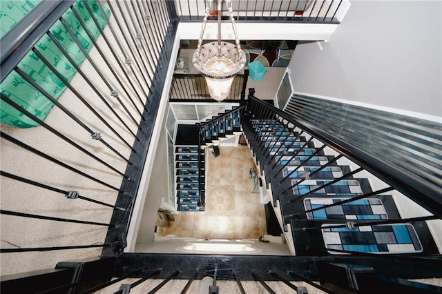 1120 Carl Bethlehem Rd, Winder, GA 30680 - stairway with a chandelier