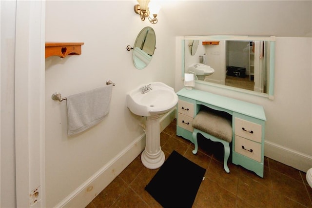 1120 Carl Bethlehem Rd, Winder, GA 30680 - bathroom with baseboards and tile patterned flooring