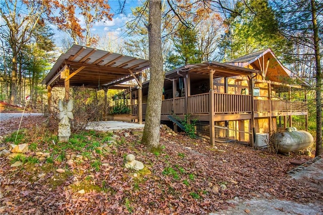 view of yard with a wooden deck