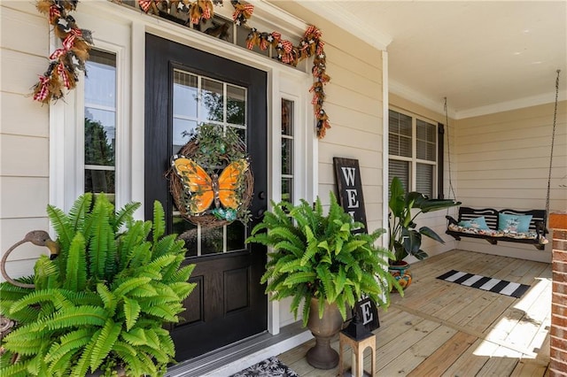 entrance to property with a porch