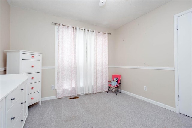 recreation room featuring carpet flooring and baseboards