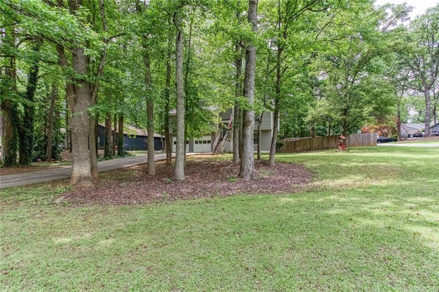 view of yard with a garage