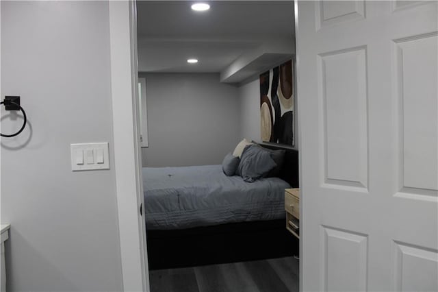 bedroom with wood-type flooring