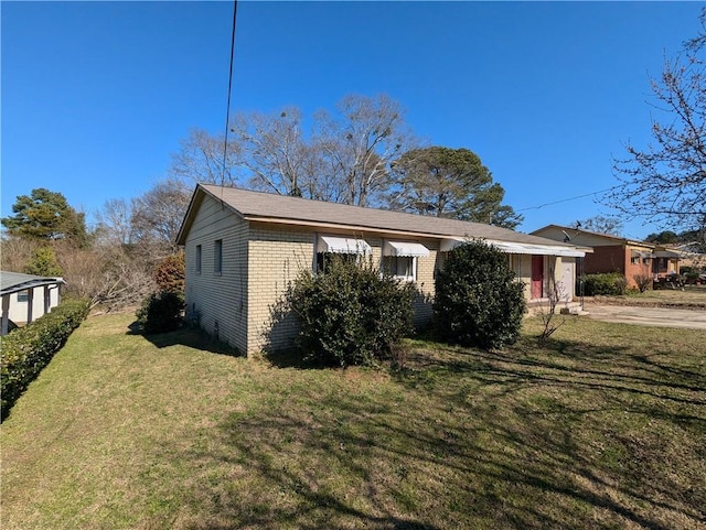 exterior space with a front yard