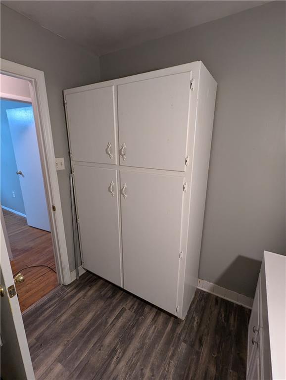 155 Cone Dr, Athens, GA 30601 - unfurnished bedroom featuring a textured ceiling, baseboards, wood finished floors, and visible vents
