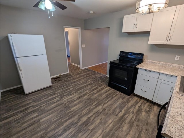 kitchen with white refrigerator, white cabinetry, dark hardwood / wood-style flooring, and black electric range oven