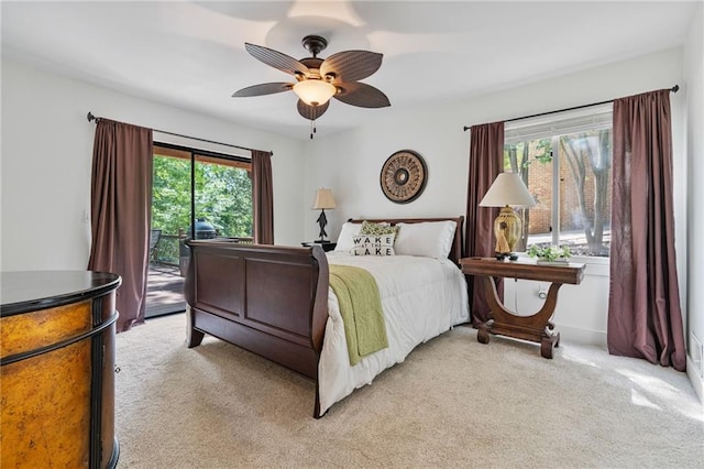 7875 Robin Rd, Cumming, GA 30041 - bedroom with light carpet, access to exterior, and ceiling fan